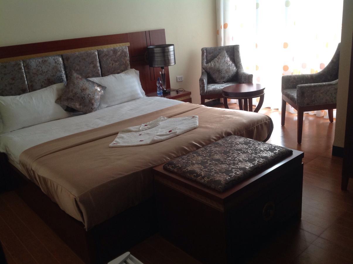 בהר דר Palm Palace Hotel מראה חיצוני תמונה