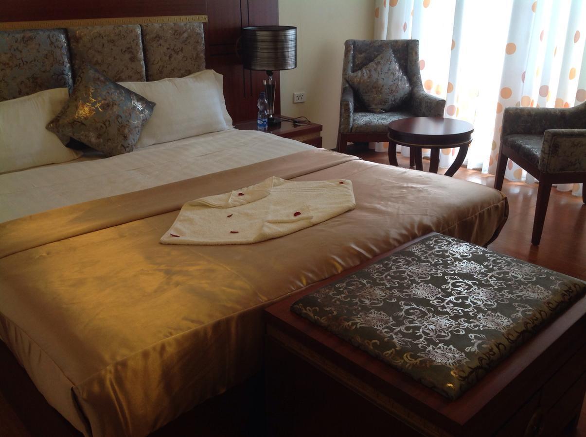 בהר דר Palm Palace Hotel מראה חיצוני תמונה