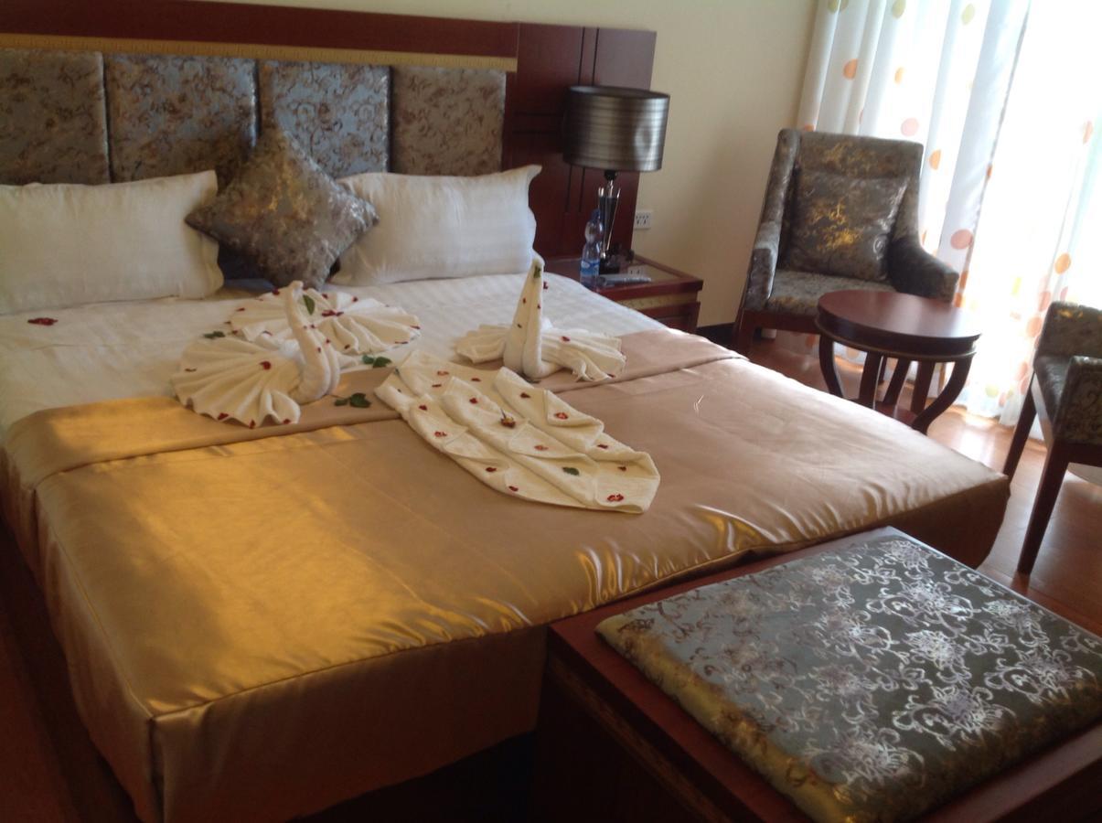 בהר דר Palm Palace Hotel מראה חיצוני תמונה