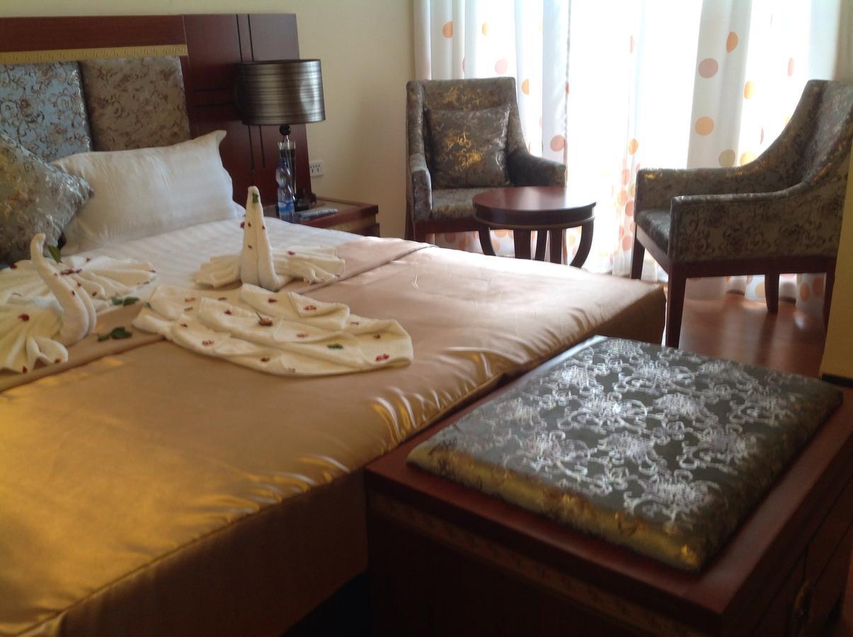 בהר דר Palm Palace Hotel מראה חיצוני תמונה