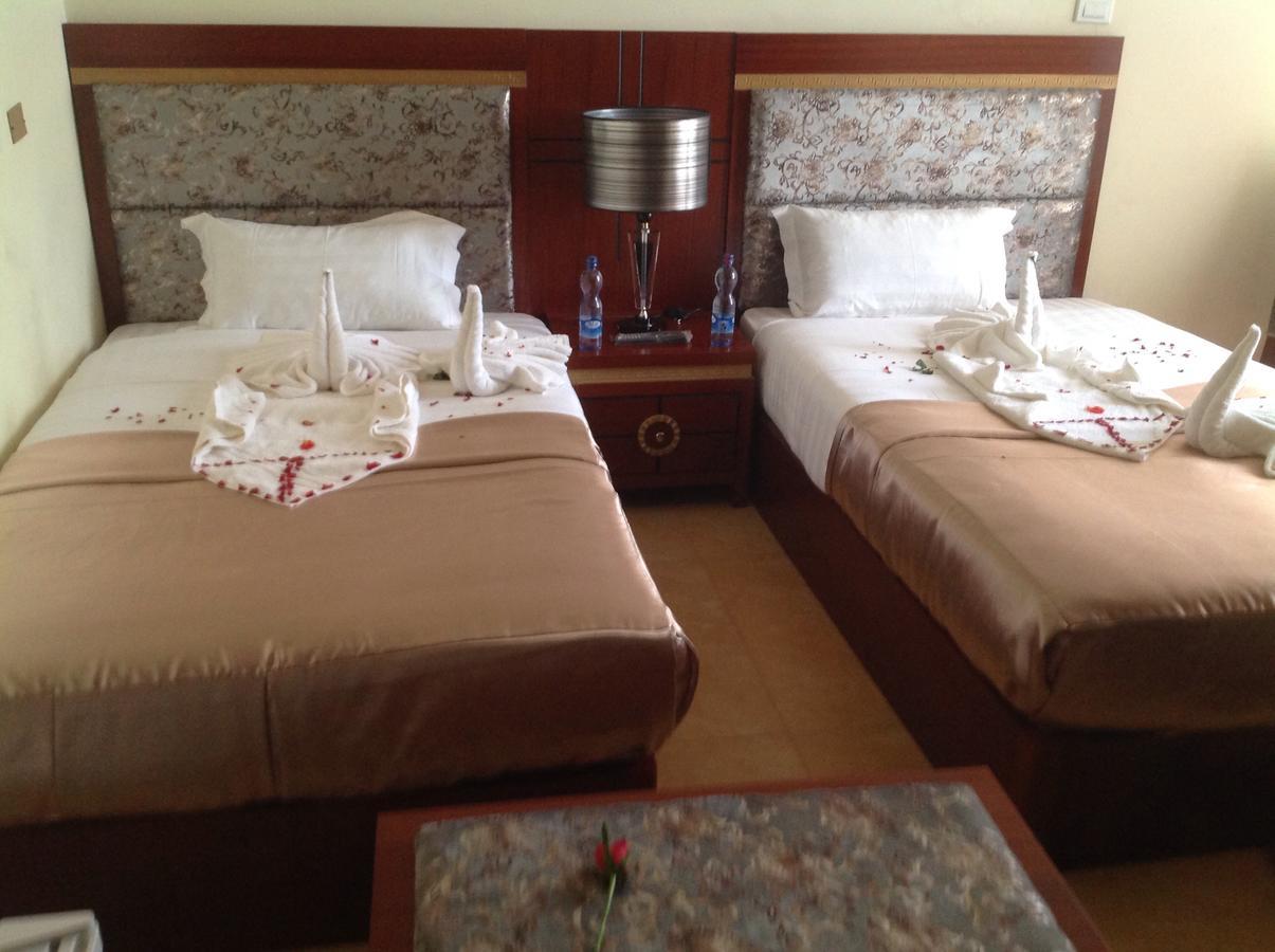בהר דר Palm Palace Hotel מראה חיצוני תמונה