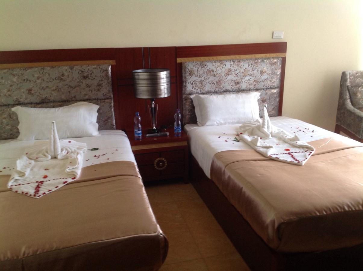 בהר דר Palm Palace Hotel מראה חיצוני תמונה