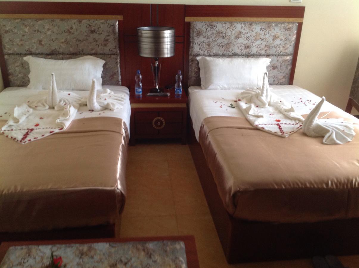 בהר דר Palm Palace Hotel מראה חיצוני תמונה